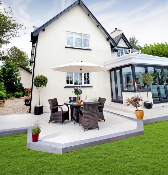 two-tone patio with grey and white porcelain paving