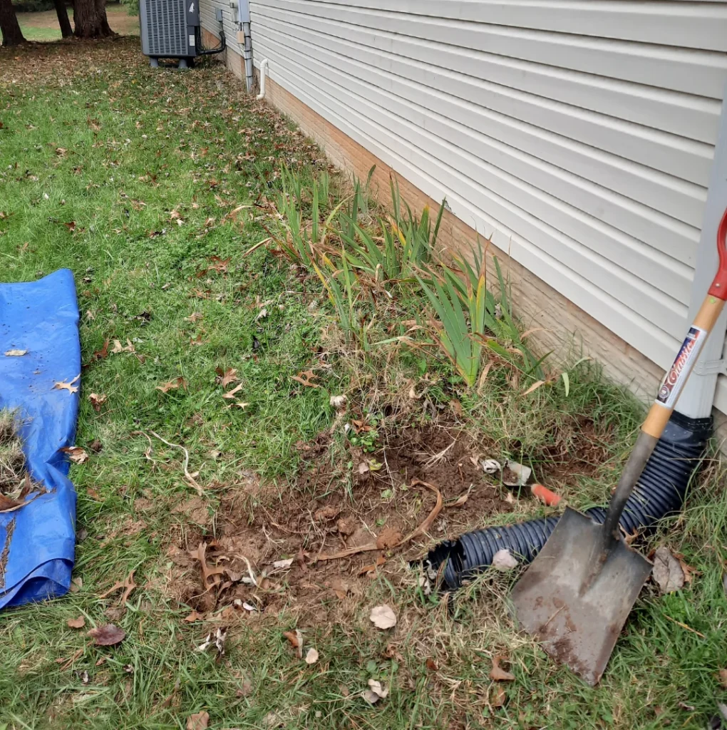 Building Cement Patio: dig out the sod and topsoil within the marked area to a depth of about six inches