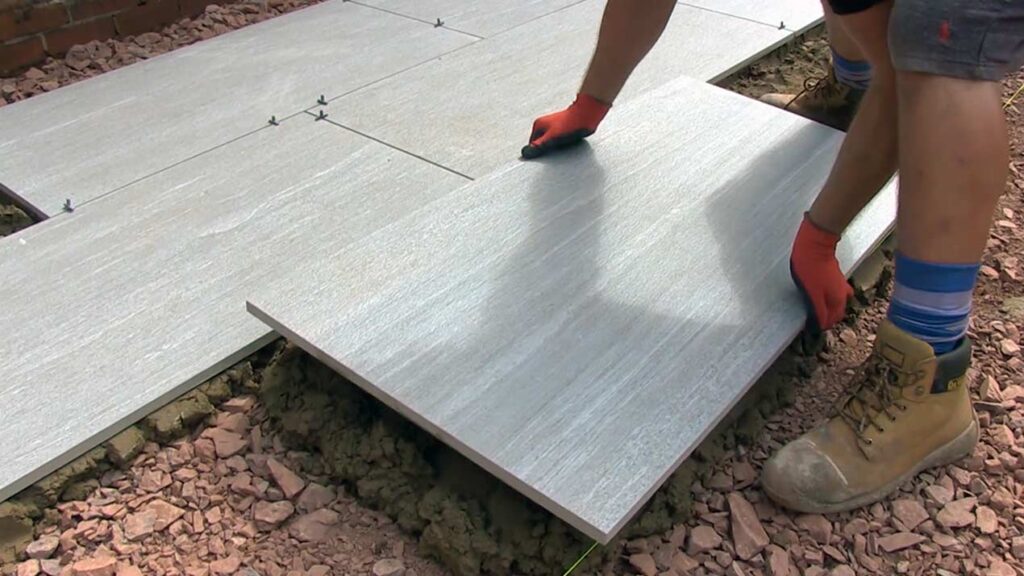 Lay the paving slabs